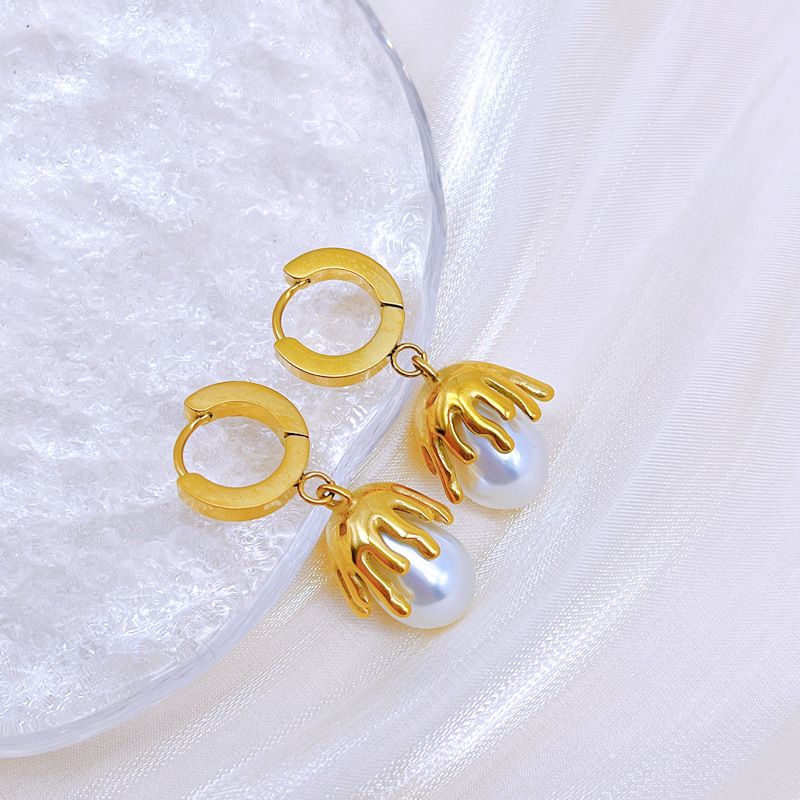 Collana con orecchini e perle intarsiate in titanio e acciaio geometrico retrò ed elegante all'ingrosso_voghion.com