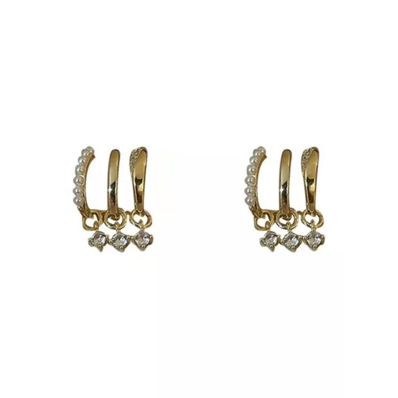 Orecchini a spillo in argento con perle tempestate di diamanti firmati un orecchino con 3 orecchini effetto orecchini di nicchia tutto-abbinamento_voghion.com