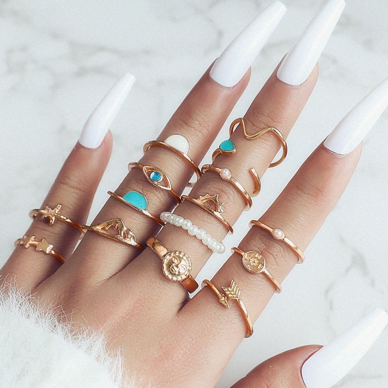 Fashionable And Personalized Diamond Pearl Pentagram Arrow Shaped Eye Opening 16 Piece Set Ring_voghion.com