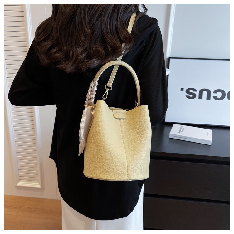 Trama di nicchia del designer, borsa a secchiello in tinta unita alla moda e versatile, borsa da donna portatile a tracolla diagonale con una spalla_voghion.com