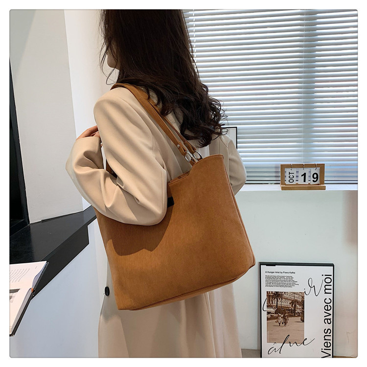 Canvas multifunctional bag women's simple and versatile commuter shoulder bag large capacity fashion tote bag_voghion.com