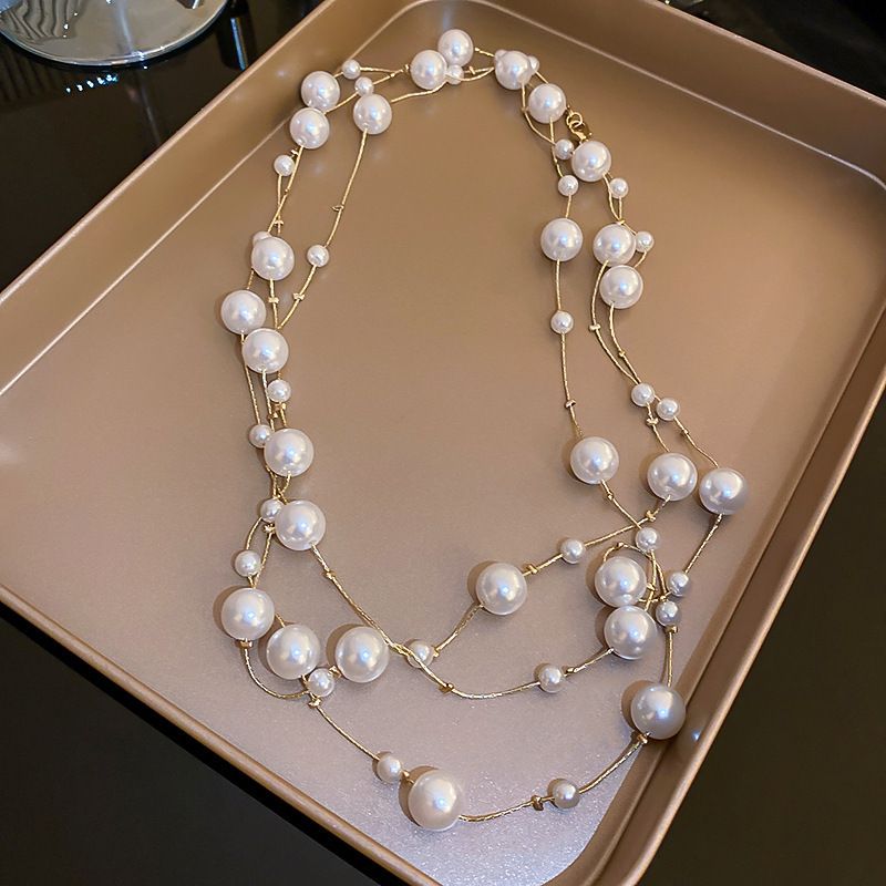 Onregelmatige lange parel Franse lichte elegante trui ketting niche eenvoudige high-end zintuiglijke ketting voor vrouwen_voghion.com