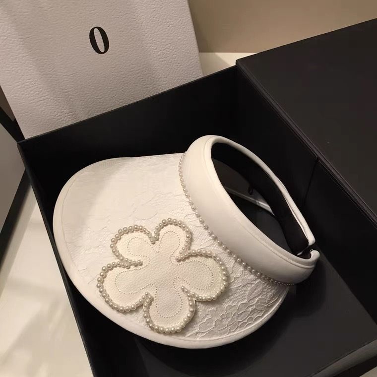 Top vuoto in stile forcina in pizzo jacquard coreano per viaggi estivi, parasole leggero con fiori di perle che riduce l'età e sole_voghion.com