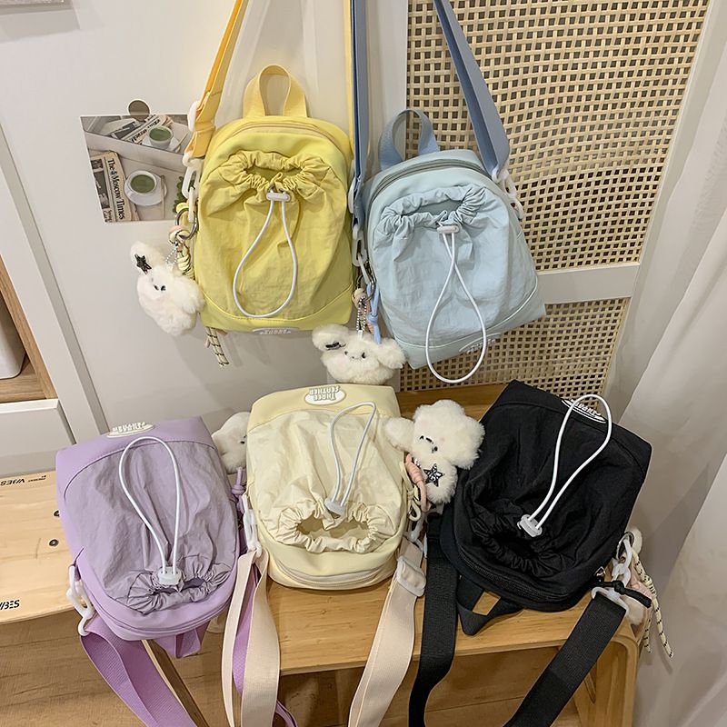 Summer High-End Commuter Phone Small For Women 2025 New Beige Lightweight Outdoor Canvas Crossbody Water Bottle Bag_voghion.com