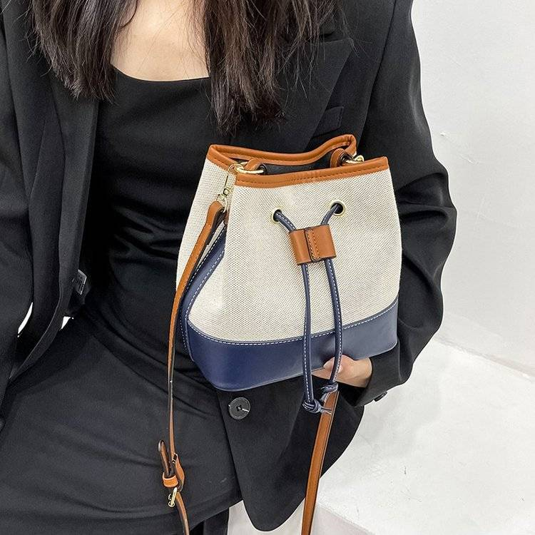 Borsa da donna 2025, nuova borsa a secchiello in tela a contrasto, borsa a tracolla con coulisse e texture alla moda._voghion.com