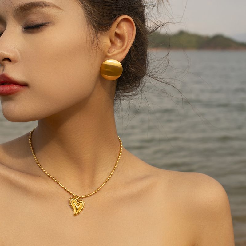 Instagram Acciaio al titanio spazzolato 2023 Nuovo design alla moda e popolare per donna con orecchini a piastra rotonda_voghion.com