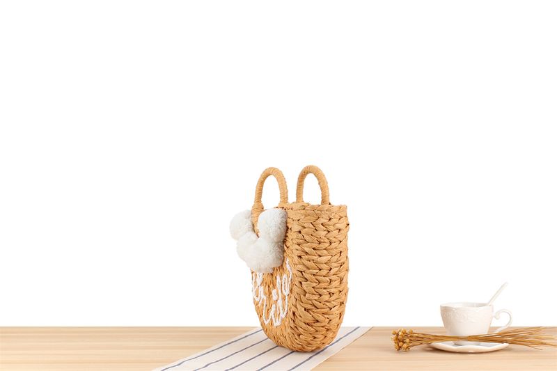 Neue Handtaschen-Stile 2024, süße Handtaschen aus Stroh mit Pompoms, handgewebte Taschen in einfarbigen Buchstaben, Strandtaschen für den Urlaub am Meer._voghion.com