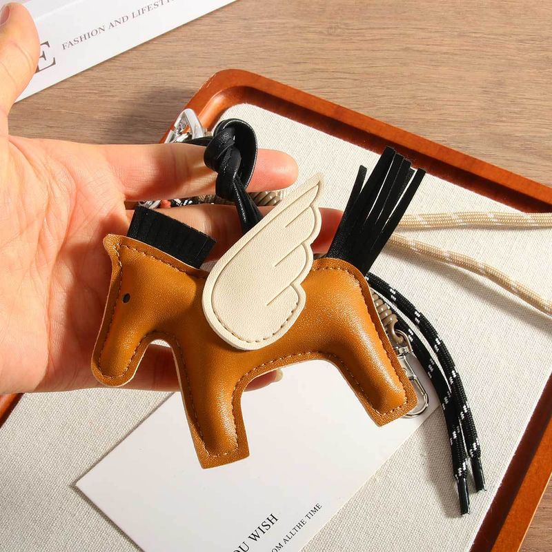 Mini ciondolo per borsa a forma di cavallo – Elegante portachiavi in pelle PU con nappe (marrone, accessorio boho chic)_voghion.com