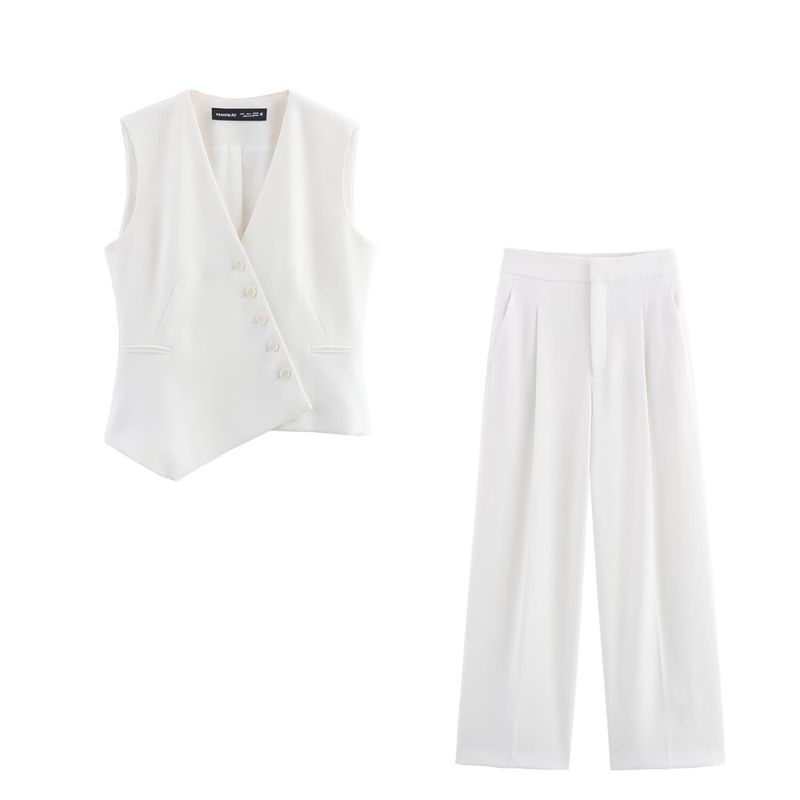 Traje de mujer de moda con chaleco asimétrico sencillo con cuello en V y pantalón ancho plisado._voghion.com