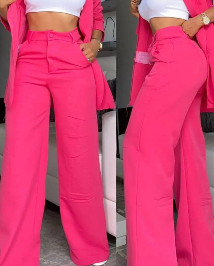 Completo da donna elegante con tasche e pantaloni dritti, a maniche corte e revers, tinta unita_voghion.com
