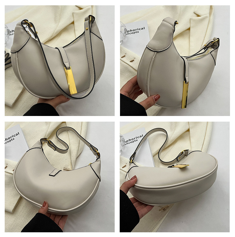 Borsa ascellare dal design di nicchia francese per la nuova borsa a mezzaluna minimalista primavera 2023 da donna Borsa a tracolla questa sensazione_voghion.com