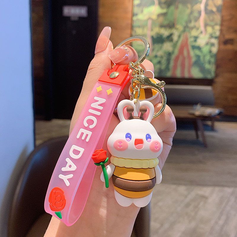 Portachiavi creativo e carino a forma di coniglietto con fiore, per donne, stile cartone animato, squisita coppia, decorazione per auto e zaino, piccolo regalo._voghion.com