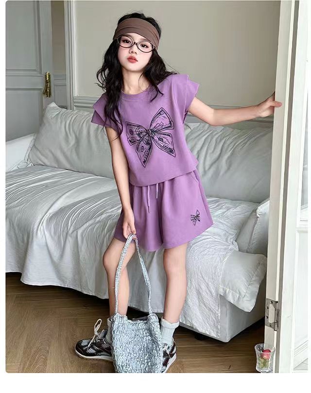 Sommarmode för flickor 2024 Nya mellanstora barntröjor med kort ärm, vida shorts, sportkläder, tvådelat set för_voghion.com