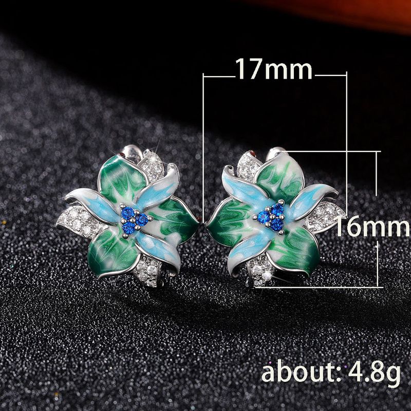 Nuovi orecchini a forma di fiore in smalto verde di Cao Shi con fibbia in zircone pendente_voghion.com