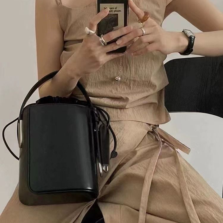 Autunno e inverno nuova nicchia secchio tracolla diagonale croce luce lusso design di fascia alta senso donne baozi madre_voghion.com