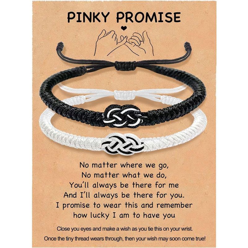 Set di braccialetti intrecciati per coppie di uomini e donne, in corda nera e rossa, intrecciati a mano e regolabili, con scritta "Anima Gemella", in bianco e nero._voghion.com