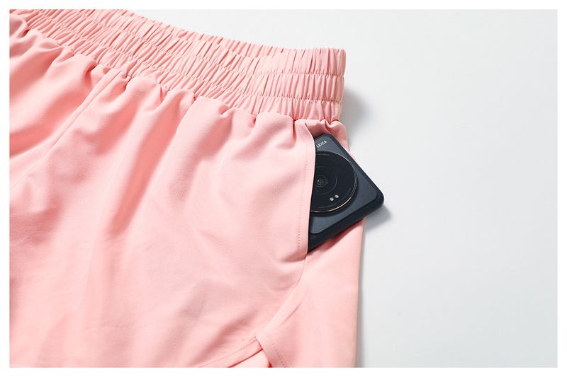 Pantaloncini da yoga a vita alta con fodera integrata, pantaloncini da allenamento traspiranti ad asciugatura rapida per donna, pantaloncini da corsa senza cuciture con design che solleva i glutei_voghion.com