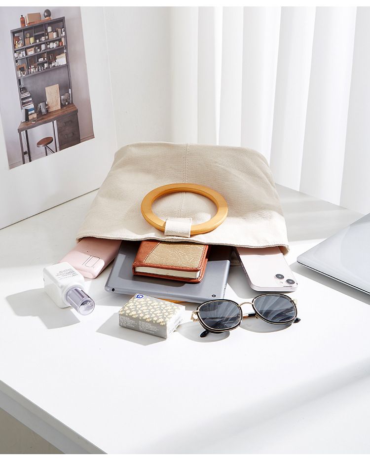 Borsa versatile e di grande capienza in versione coreana, la nuova borsa da donna minimalista in tela di quest'anno, manico in legno_voghion.com