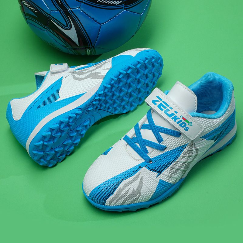 Scarpe da calcio del marchio Zhenzu, scarpe da calcio per bambini senza lacci, suola in gomma TF, scarpe da allenamento in erba sintetica per la scuola primaria_voghion.com