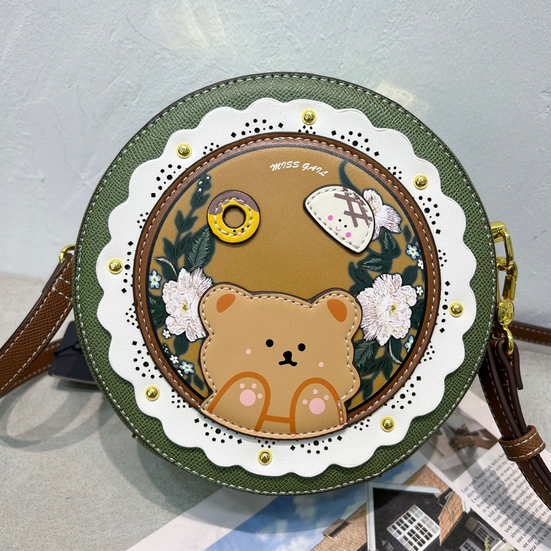 Borsa da donna, stampa vintage, borsa rotonda traforata, borsa a tracolla dal design di nicchia_voghion.com