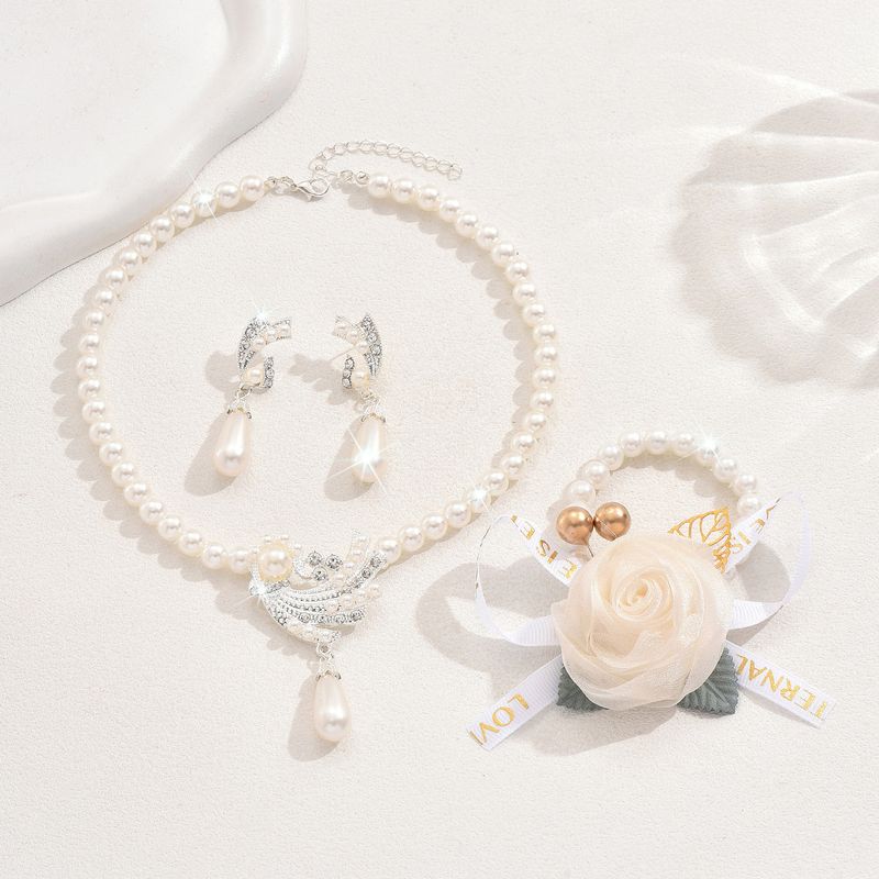 Set di gioielli da donna alla moda, collana di perle, orecchini, bracciale, set di fiori in lega, abito da sposa, personalità, temperamento alla moda femminile_voghion.com