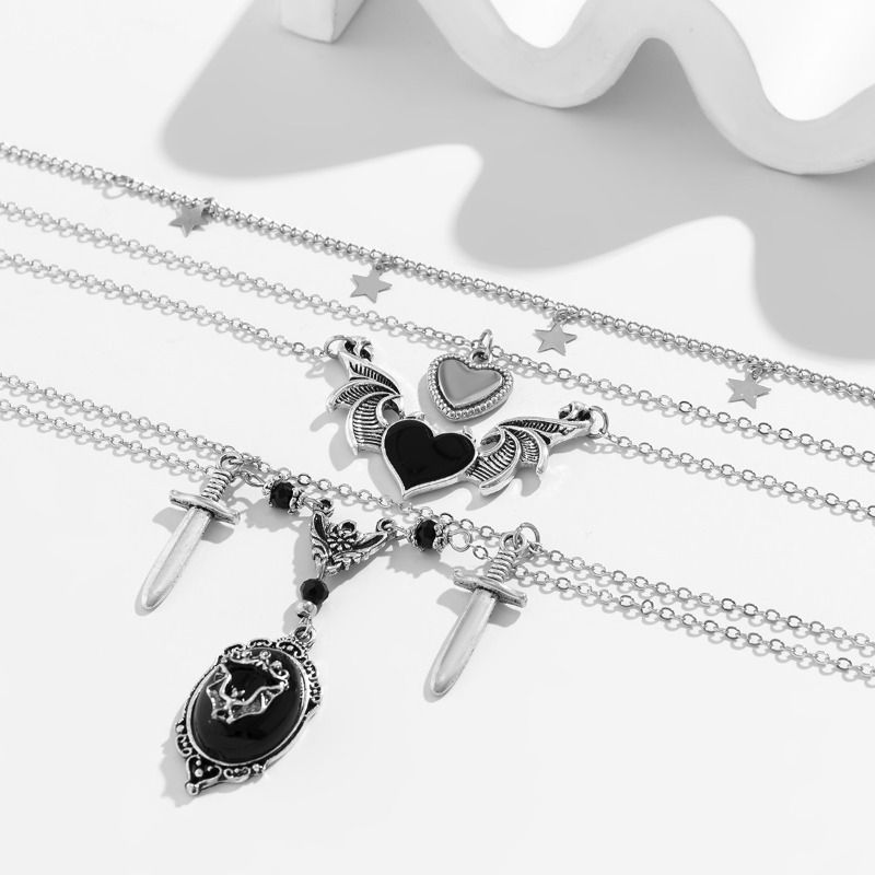 Set di collane gotiche a strati color argento per donna, collana multifilo con ciondolo a forma di cuore scuro punk, ala e pugnale, gioiello di tendenza della sottocultura alternativa_voghion.com
