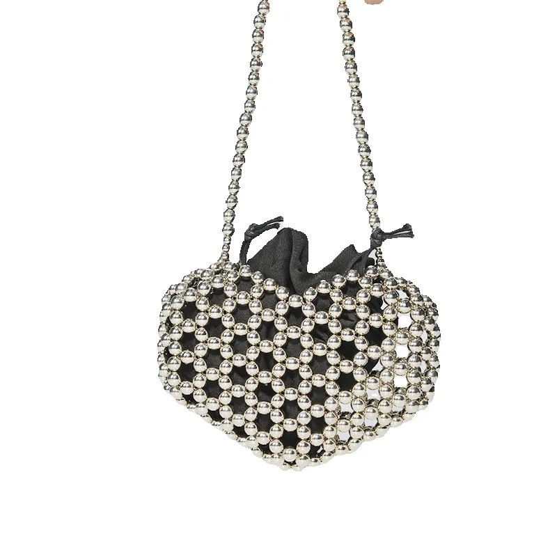 Nuova borsa sottobraccio con perline cave autunno/inverno 2025_voghion.com