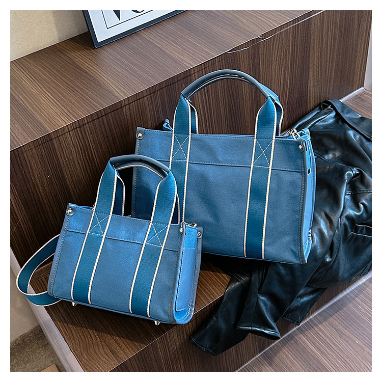Japan and South Korea Foreign Trade Canvas Bag Women 2023 New Trendy Fashion handbag niche hit color commuting shoulder Messenger bag_voghion.com