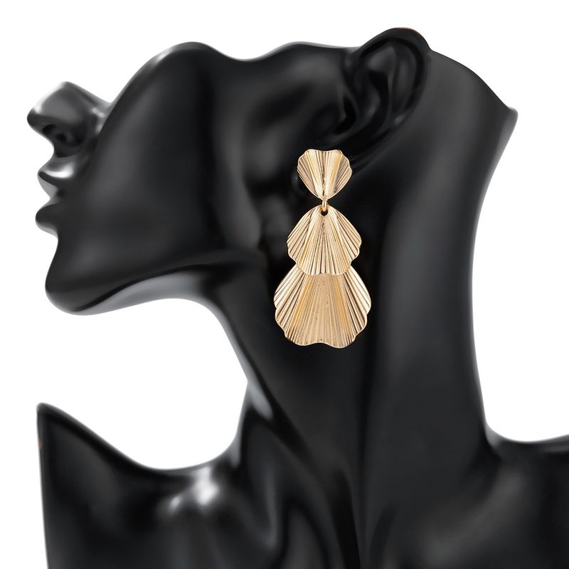 Personality metal geometric texture hollow earrings female irregular twisted glossy earrings earrings_voghion.com