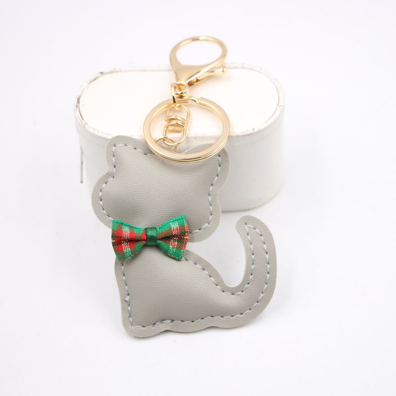 Nuovo ciondolo portachiavi in pelle a forma di papillon con gatto, accessorio per zaino, portafoglio_voghion.com