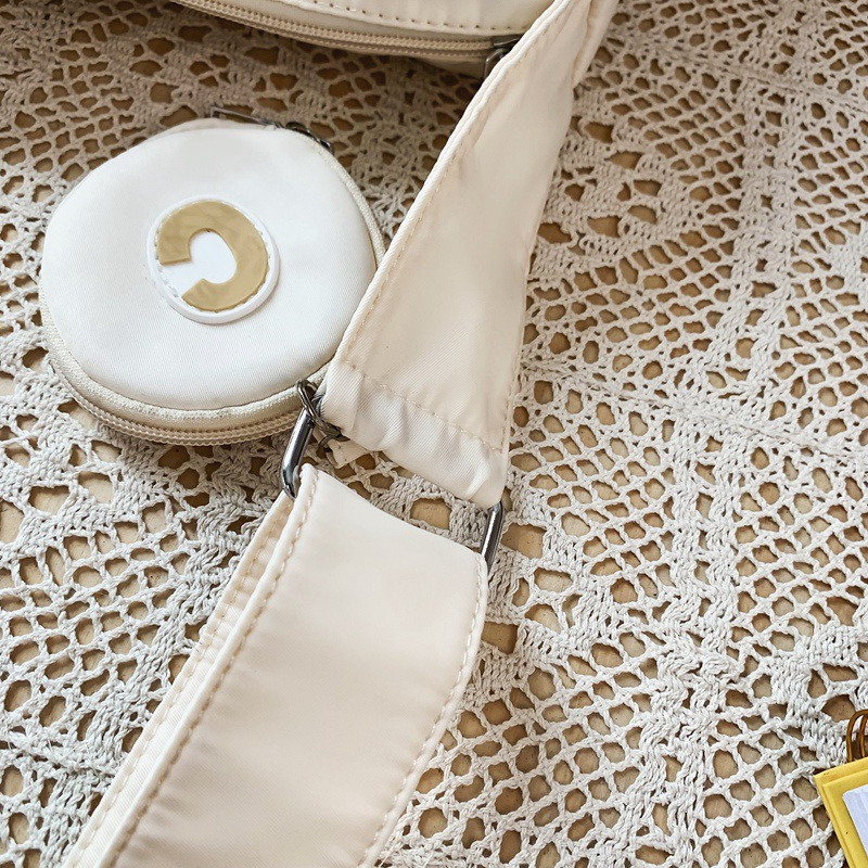 Bolso de Material de tela de nailon para mujer, nuevo diseño de nicho, diseño de banda ancha, bandolera de un hombro, bolso de bola de masa para mujer_voghion.com