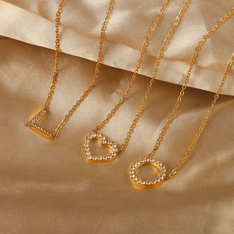 Collana con ciondolo in zirconia cubica con collare in acciaio inossidabile dorato a forma di cuore circolare geometrico cavo per donna_voghion.com
