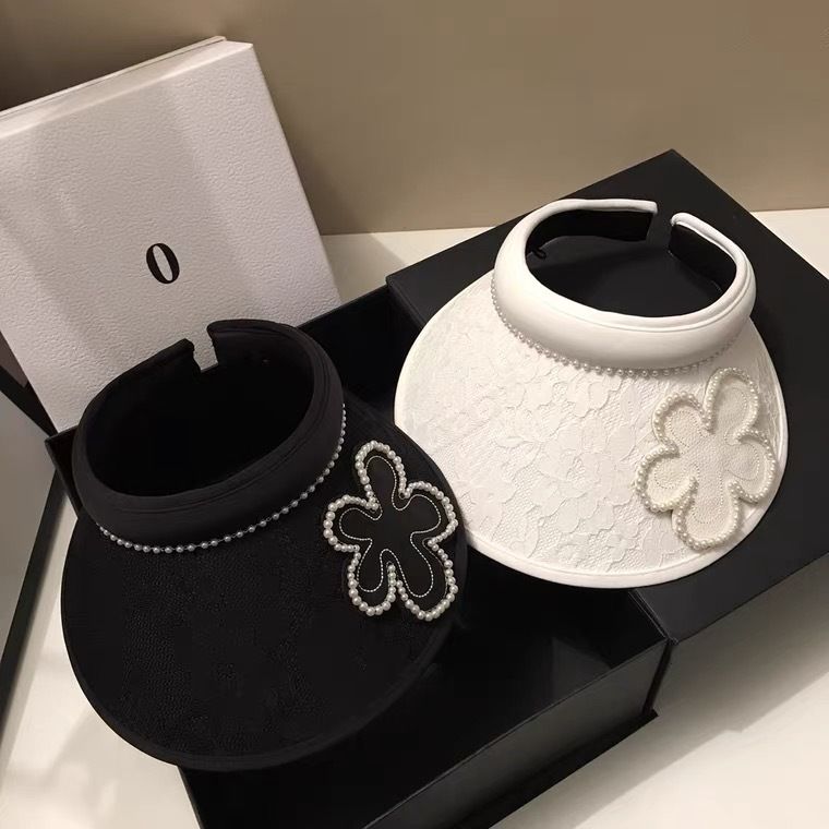 Top vuoto in stile forcina in pizzo jacquard coreano per viaggi estivi, parasole leggero con fiori di perle che riduce l'età e sole_voghion.com