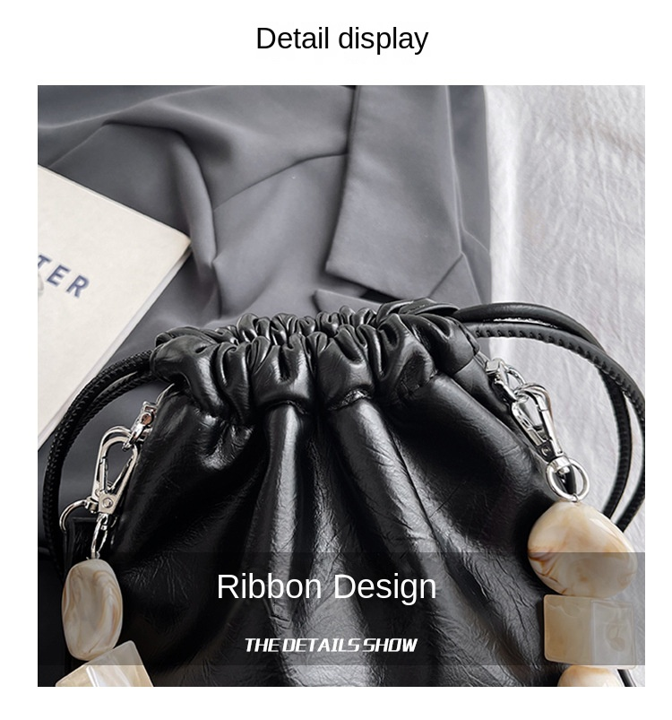 Autumn and winter minority foreign milk candy pearl drawstring fold Korean style advanced sense of light luxury 100 shoulder armpit oblique span bag_voghion.com