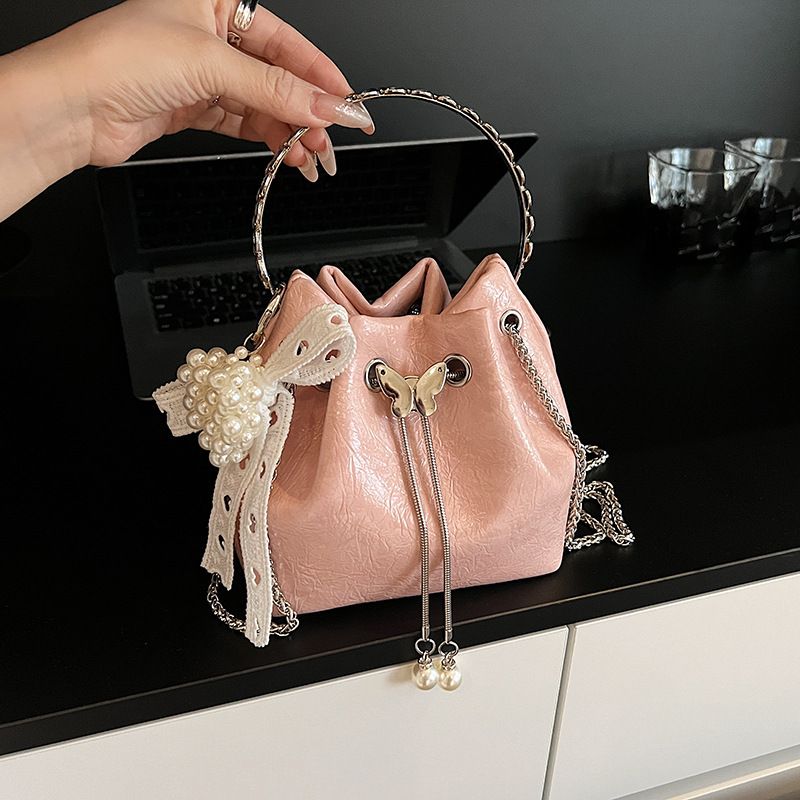 Niche Designer For Women 2025 New Summer Fashion Handbag Bucket Versatile Commuter Chain Crossbody Bag_voghion.com