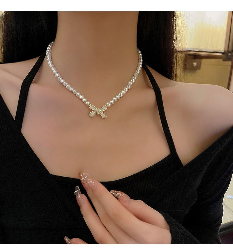 Elegante parelketting voor vrouwen in stijl, licht luxe niche-ontwerp, veelzijdige strik sleutelbeenketting_voghion.com