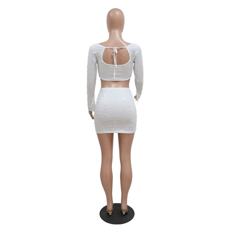 CY900335 Set due pezzi di moda europea e americana, top corto sexy monospalla a maniche lunghe e gonna a fessura_voghion.com