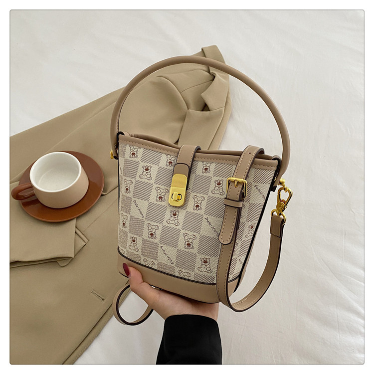 2023 Nuova borsa a secchiello stampata a quadri dal design originale di nicchia con sensazione di fascia alta, lusso leggero, borsa a tracolla versatile, borsa da donna alla moda_voghion.com