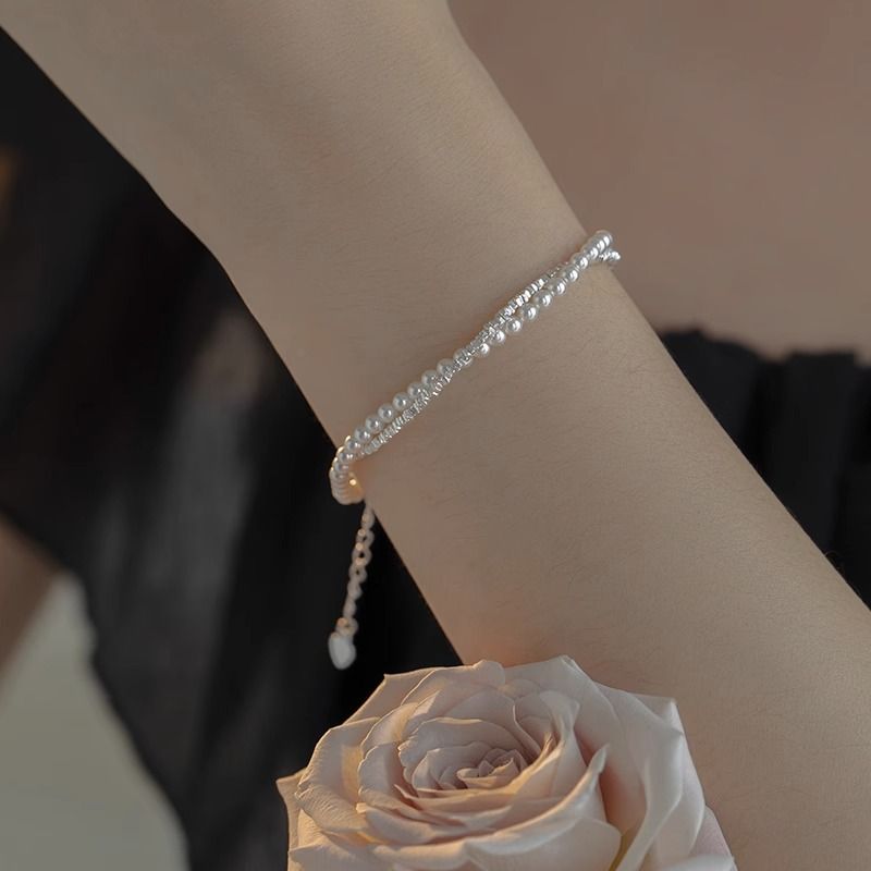 Gedraaide zilveren parelarmband voor dames, licht luxueus nicheontwerp, hoogwaardige kralensieraden, prachtig cadeau voor meisjes_voghion.com