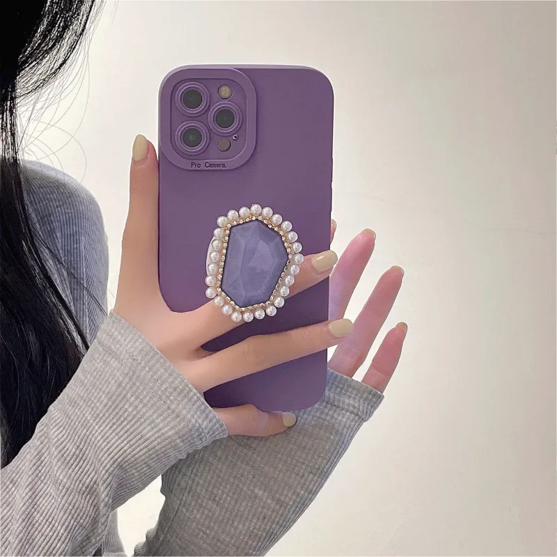Oogpaarse edelsteen glitterhouder geschikt voor iPhone 15, 14, 12, 11, 13 Promax precisiegat volledig pakket telefoonhoesje_voghion.com