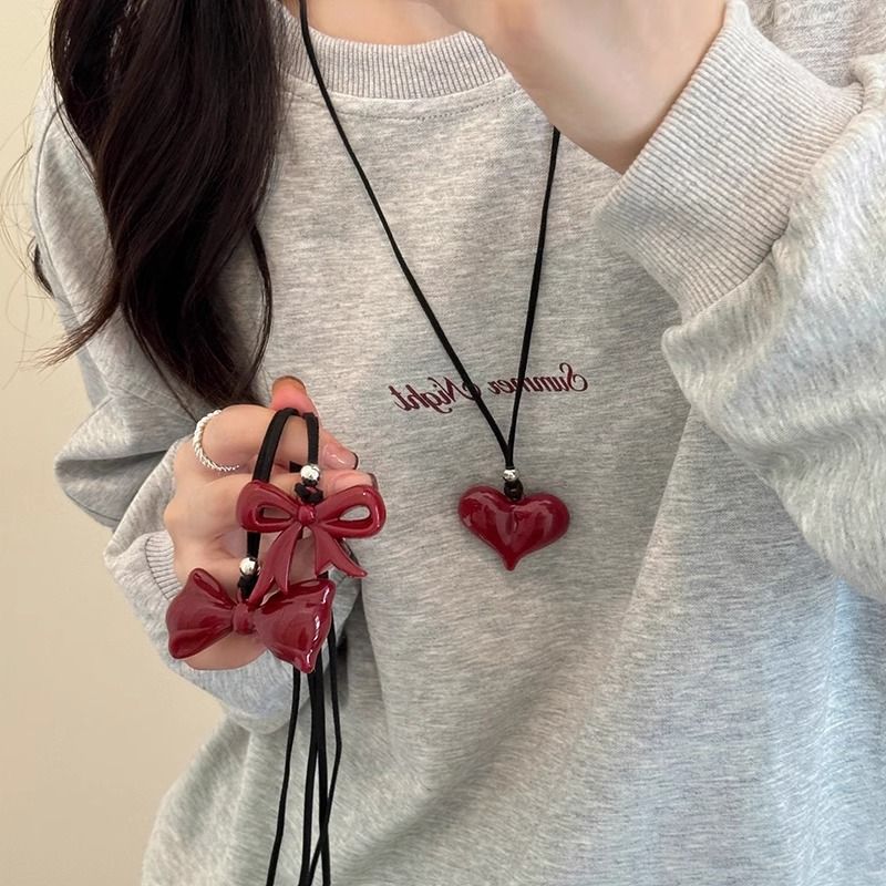Collana con cuore e fiocco rosso Ancora per donna, accessorio girocollo lungo in corda nera di alta qualità, design di nicchia, catena per maglione_voghion.com