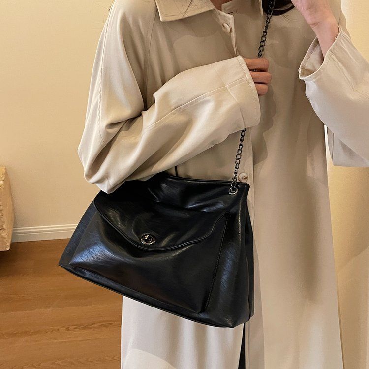 Our women's bag is not just an accessory, but also a symbol of your confidence. Shoulder bag, zipper, stitching PU_voghion.com