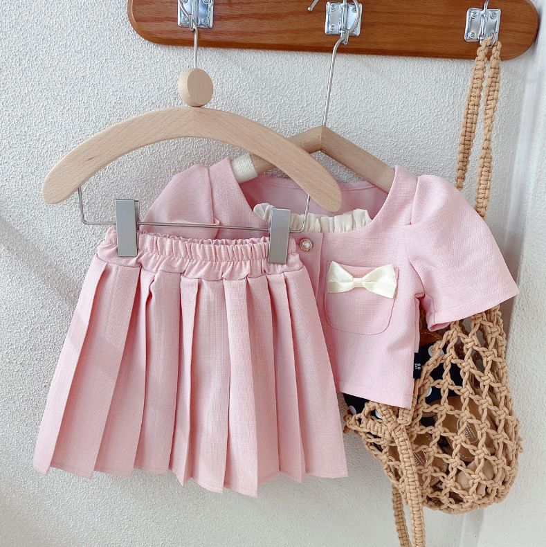 Ropa para niños Ropa para niñas Conjunto de dos piezas con falda plisada y mangas cortas con lazo pequeño_voghion.com