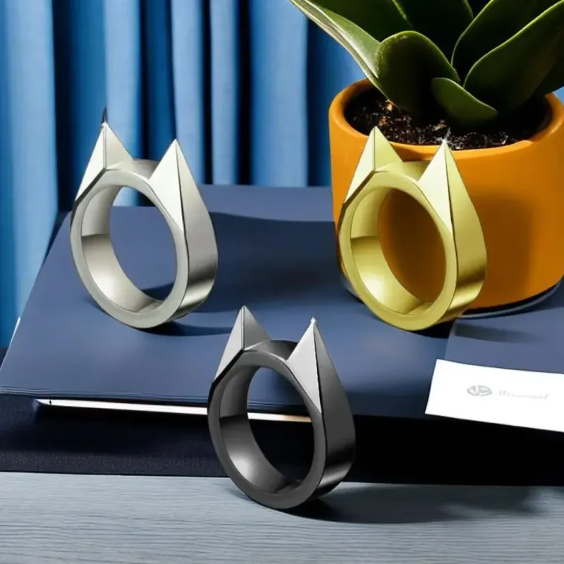Vendas quentes Vendas quentes Mulheres Homens Bonito Autodefesa Multifuncional Metal Knuckle Cat Ear Attack Anéis Unissex Jóias Acessórios_voghion.com