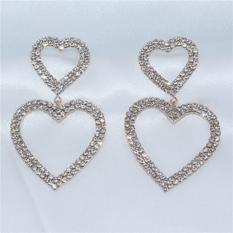 Orecchini femminili romantici dolci a forma di cuore di pesca vuoto di celebrità di Internet di moda coreana squisita_voghion.com