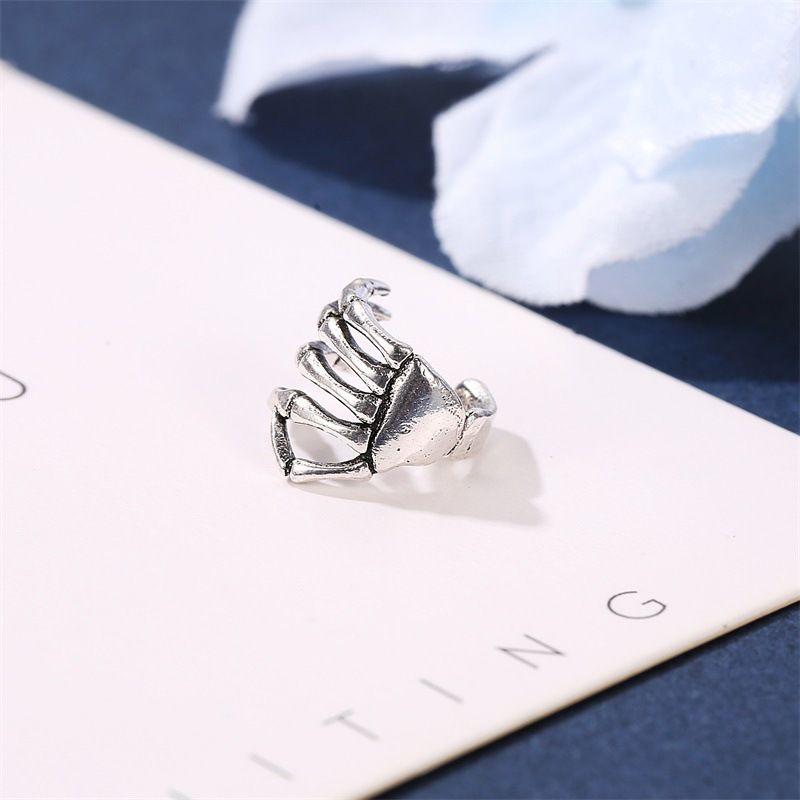 Materiale in rame, teschio personalizzato, mano, spina dorsale, osso, polsino, perno, senza piercing, clip per orecchini._voghion.com