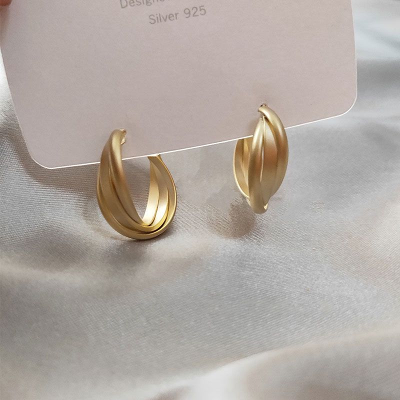 Ago d'argento Metallo Vento Circolare Geometrico Moda Pendolarismo Semplicità Semplice Cerchio Personalizzato Temperamento Di Alta Gamma_voghion.com