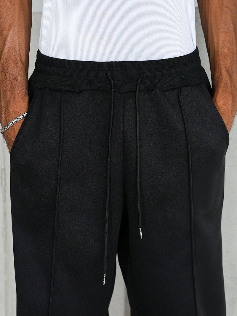 "Men's Oversized Drop-Crotch Joggers – Relaxed Fit Polyester Sweatpants With Elastic Waist & Urban Panel Design (S-2XL, Black & 4 Street Colors)"_voghion.com