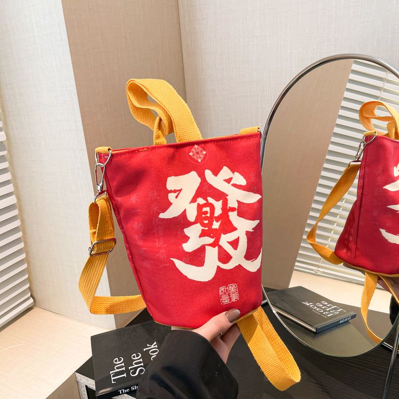 2025 Spring Lingyin Money Bucket Canvas Women's Shoulder Handbag Casual Travel Same Style Cloth Bag_voghion.com