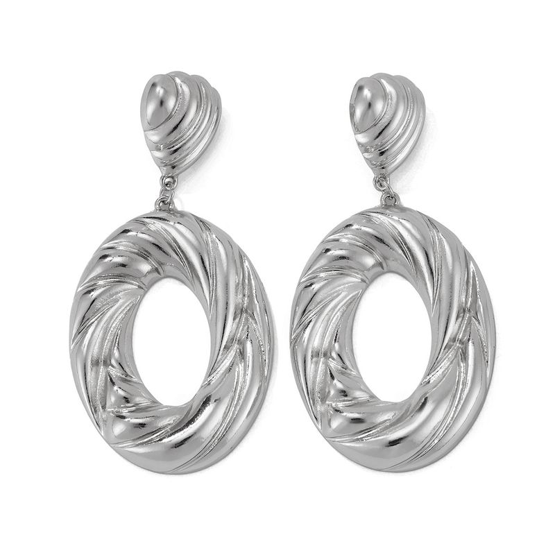 Personality metal geometric texture hollow earrings female irregular twisted glossy earrings earrings_voghion.com